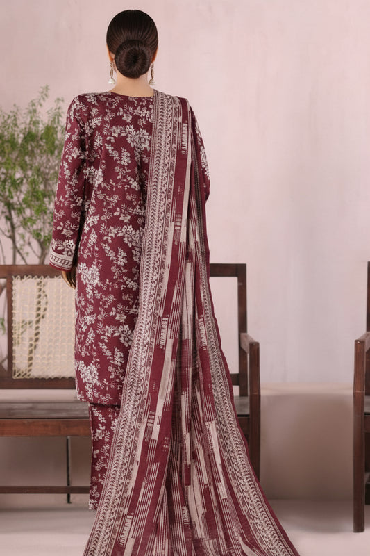 Maroon floral dress with matching dupatta on a woman model against a light pink background