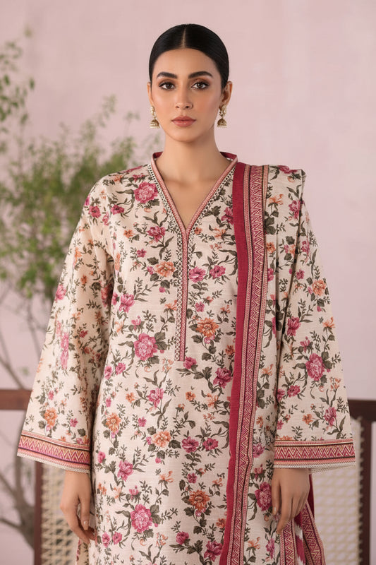 Floral dress on a mannequin against a light pink background with decorative elements.