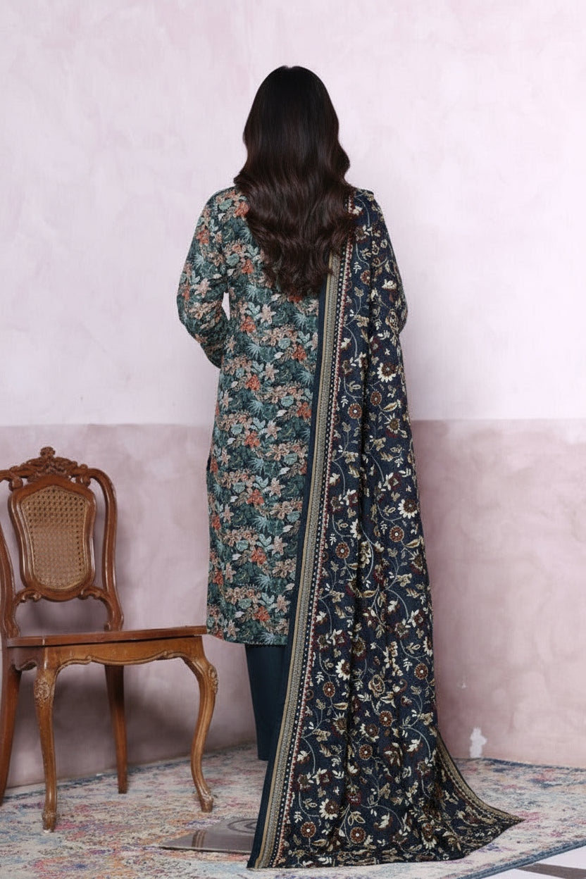 Floral patterned outfit on a woman model with a pink wall and wooden chair in the background