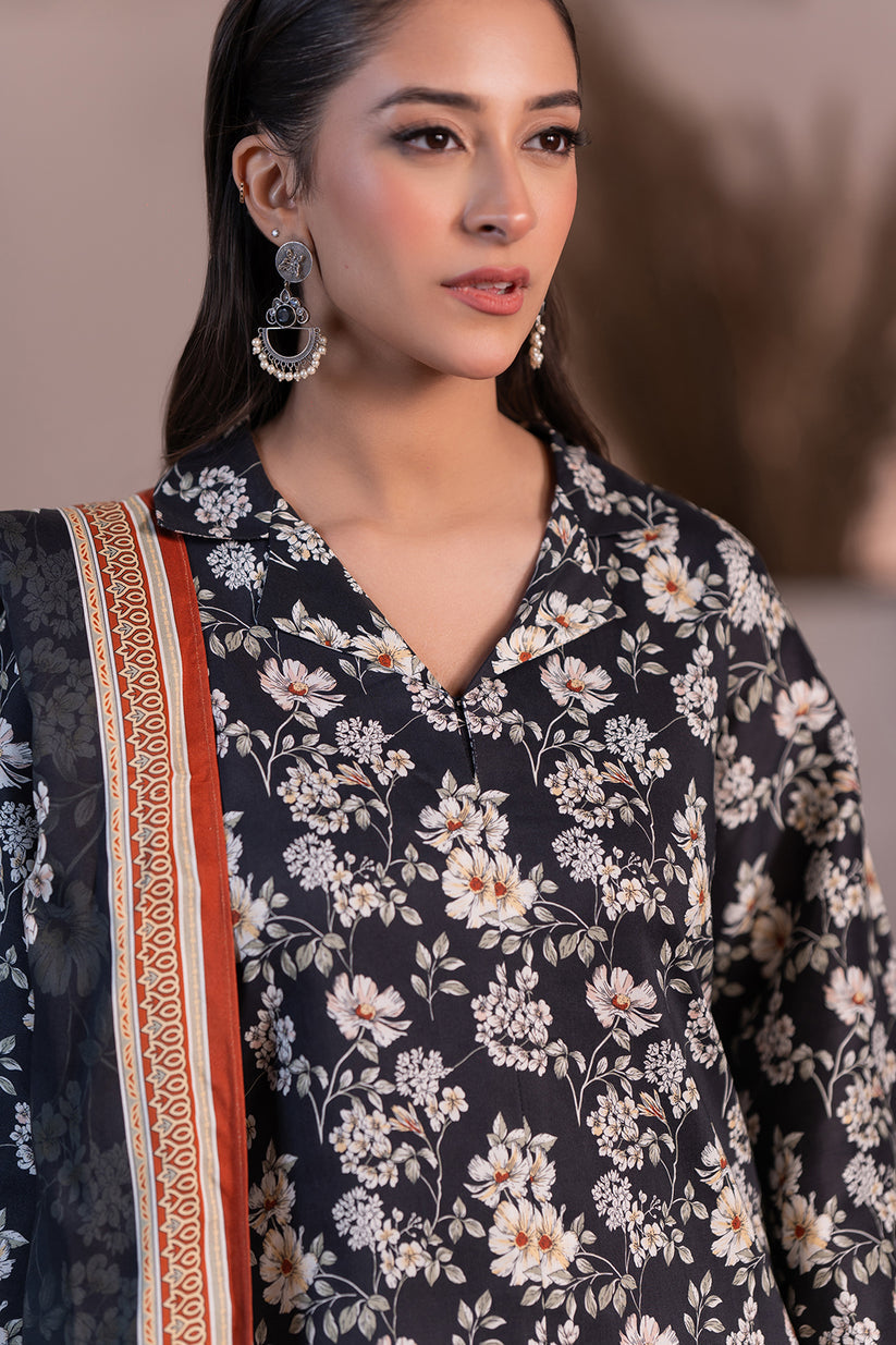 Woman wearing a floral kurta with a dark background