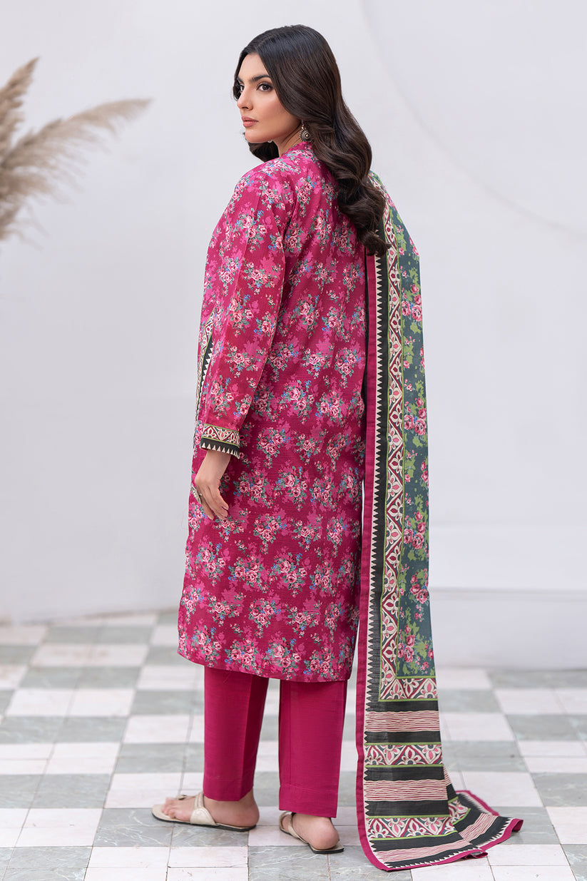 Woman wearing a pink traditional outfit with a matching dupatta on a white background